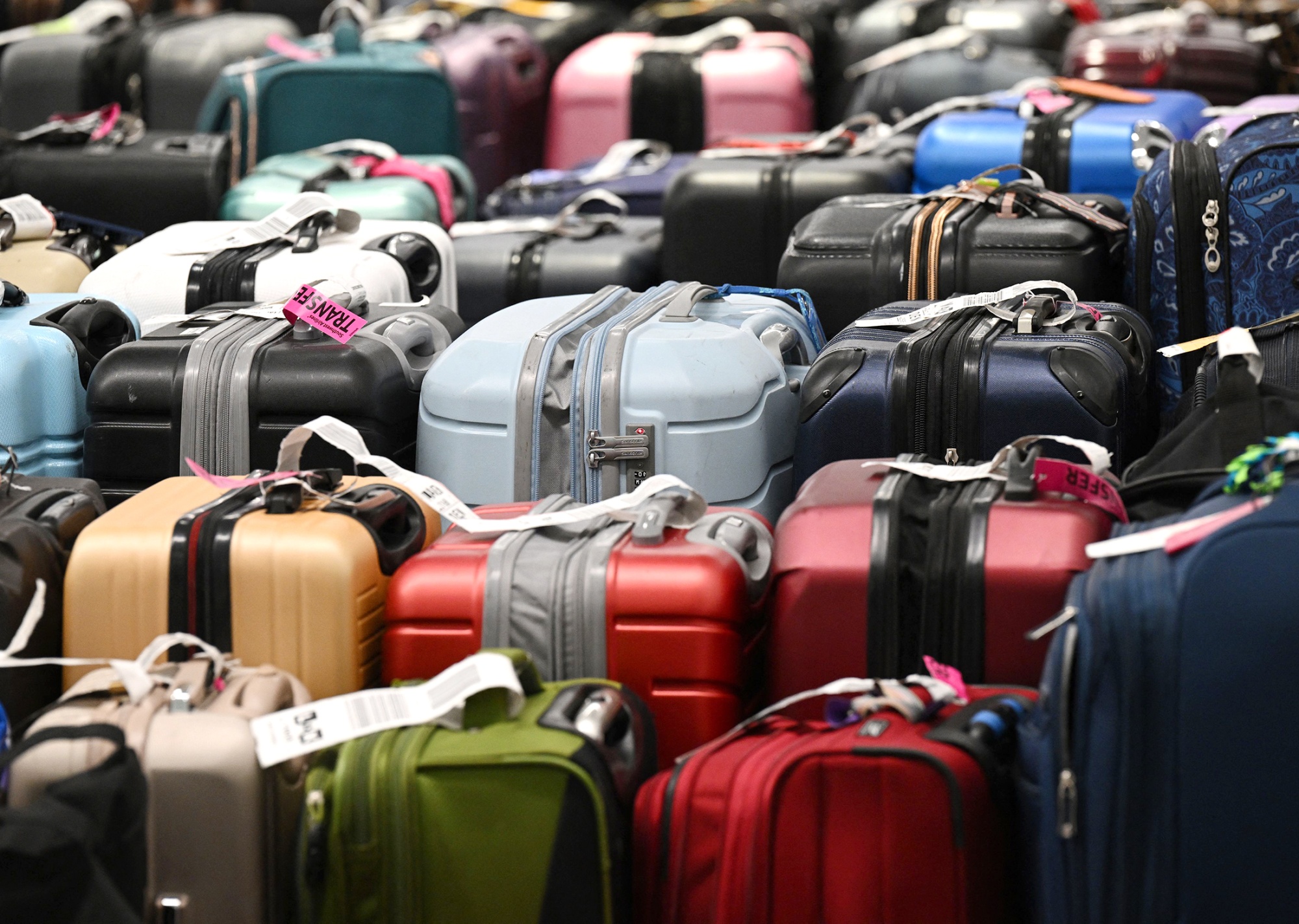 Flight cancellations have led to scores of unclaimed luggage : NPR