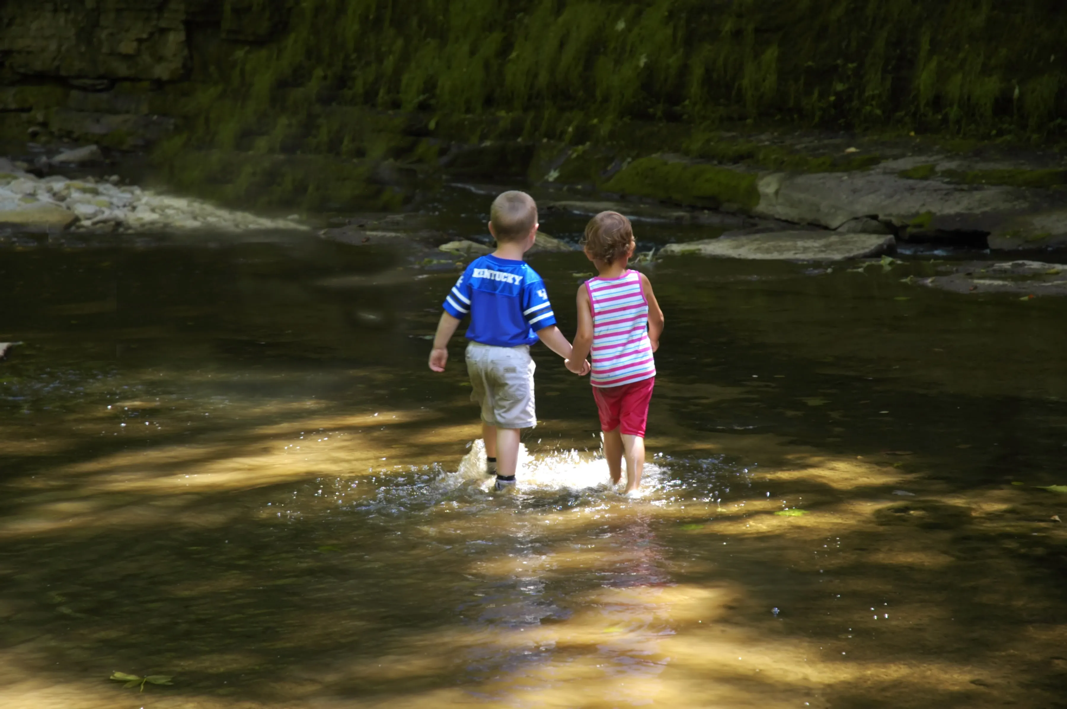 “Cross the river by feeling the stones.”