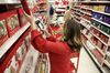Target employee Lindsay Walker at a store in New Jersey. More than 80 percent of non-union private-sector employees in the U.S. will be bound by forced arbitration clauses by 2024, according to a new report.