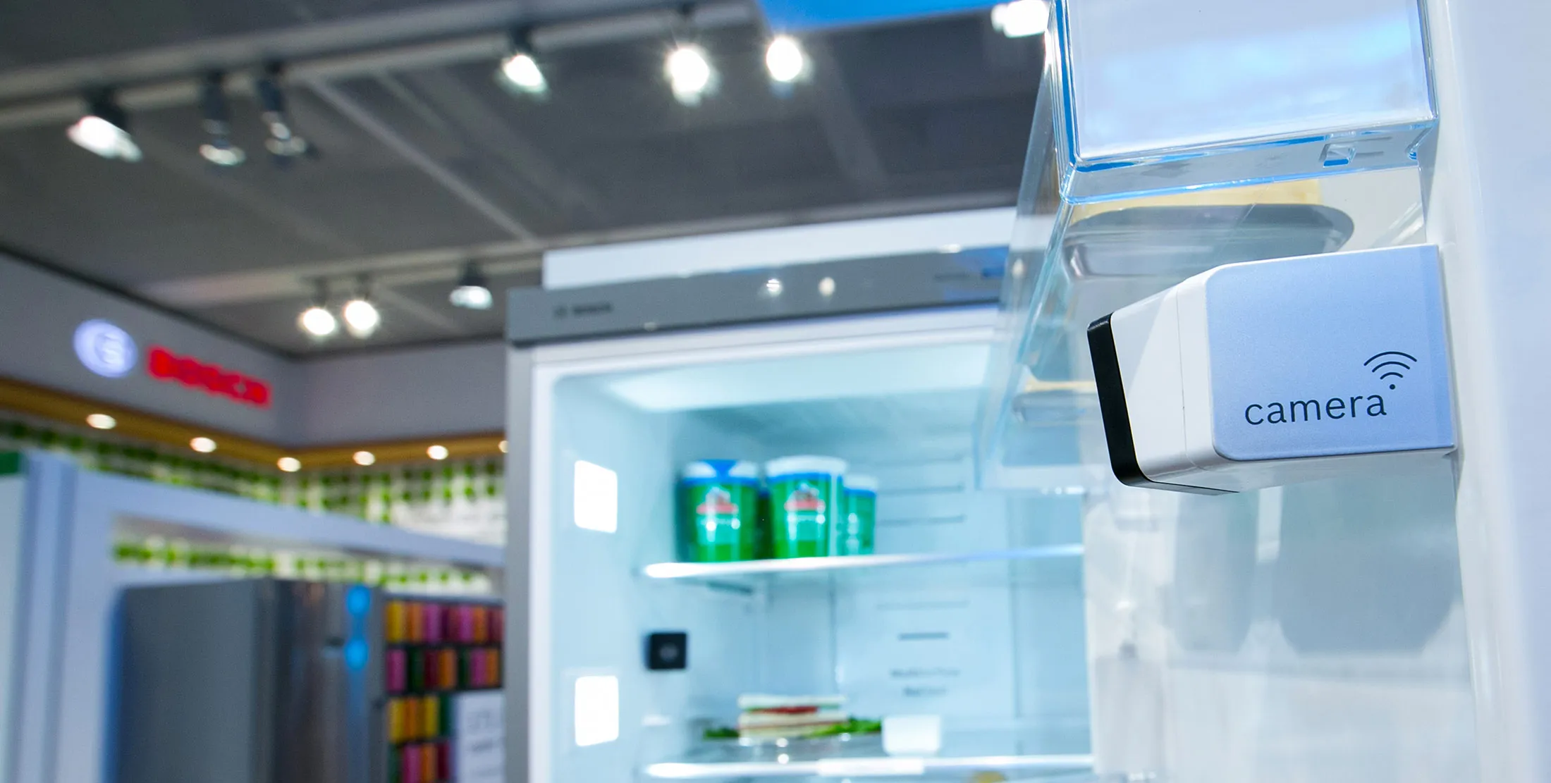 A camera unit sits inside a Vitafresh smartfridge refrigerator.
