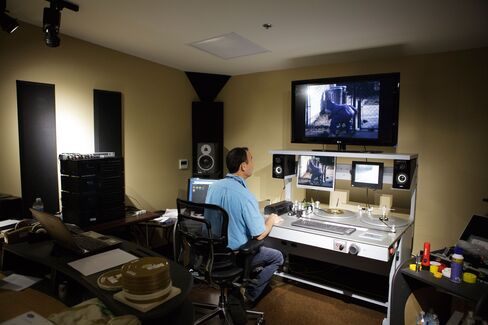 An employee works in an editing bay at the Iron Mountain archival facility in Hollywood.
