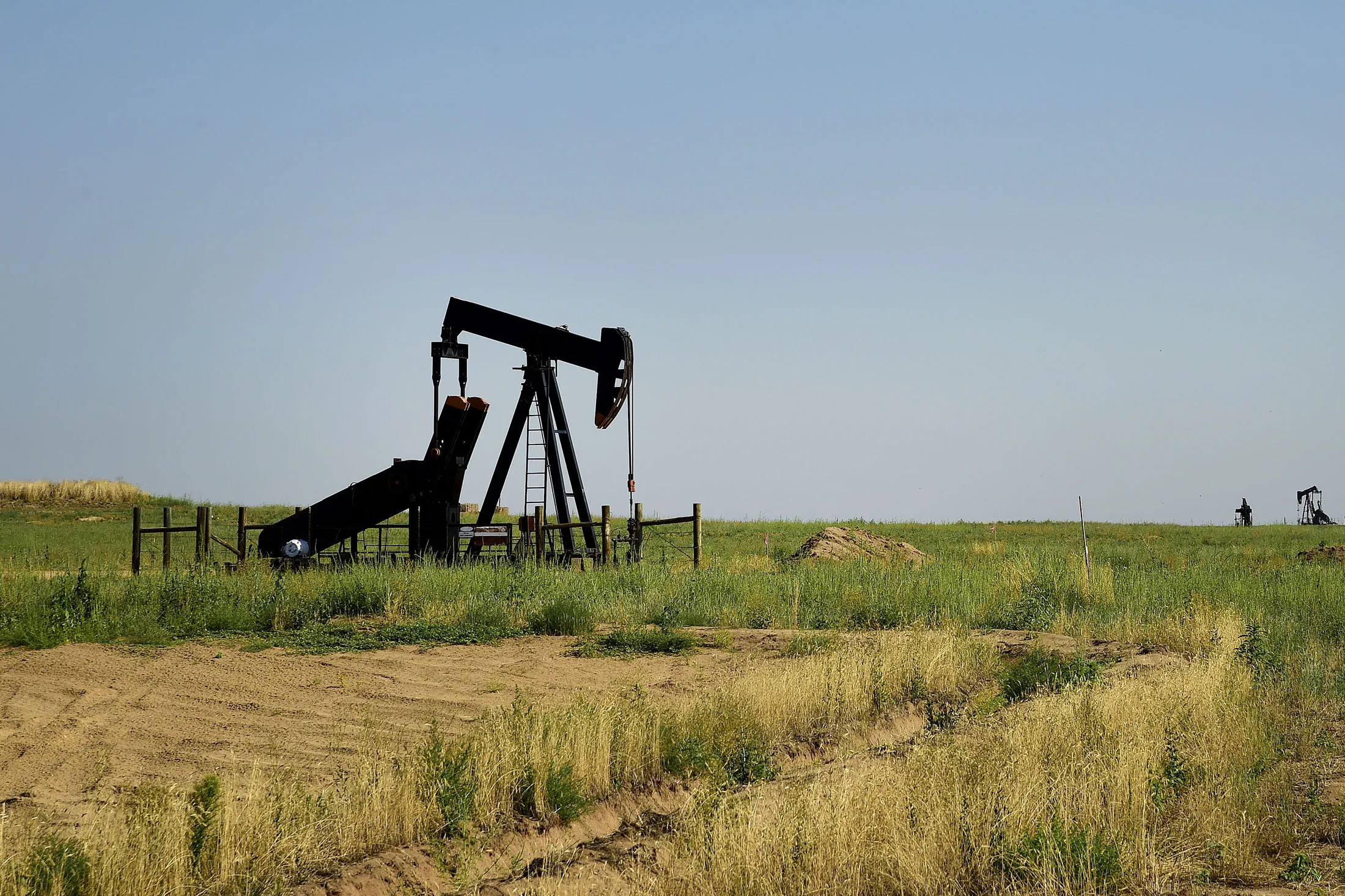 Pumping jacks stand near an Anadarko Petroleum oil rig site in Fort Lupton, Colorado, U.S.
