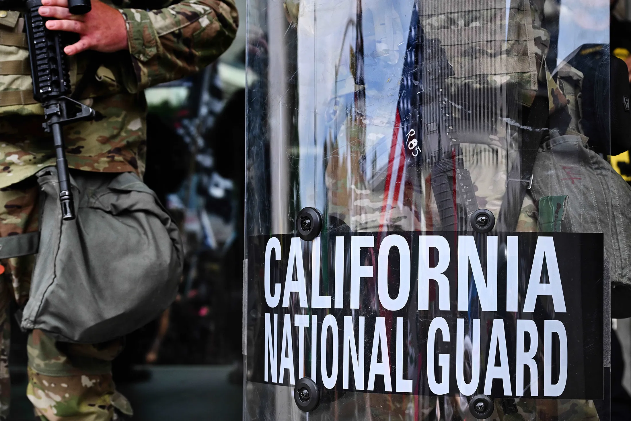 Members of the California National Guard&nbsp;stand guard in front of the Edward R. Roybal Federal Building during the 'No Kings' protest&nbsp;in Los Angeles on&nbsp;June 14.
