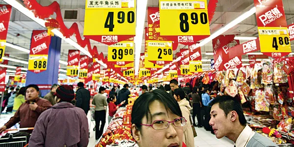Shoppers check out the glitz at a Beijing hypermarket 