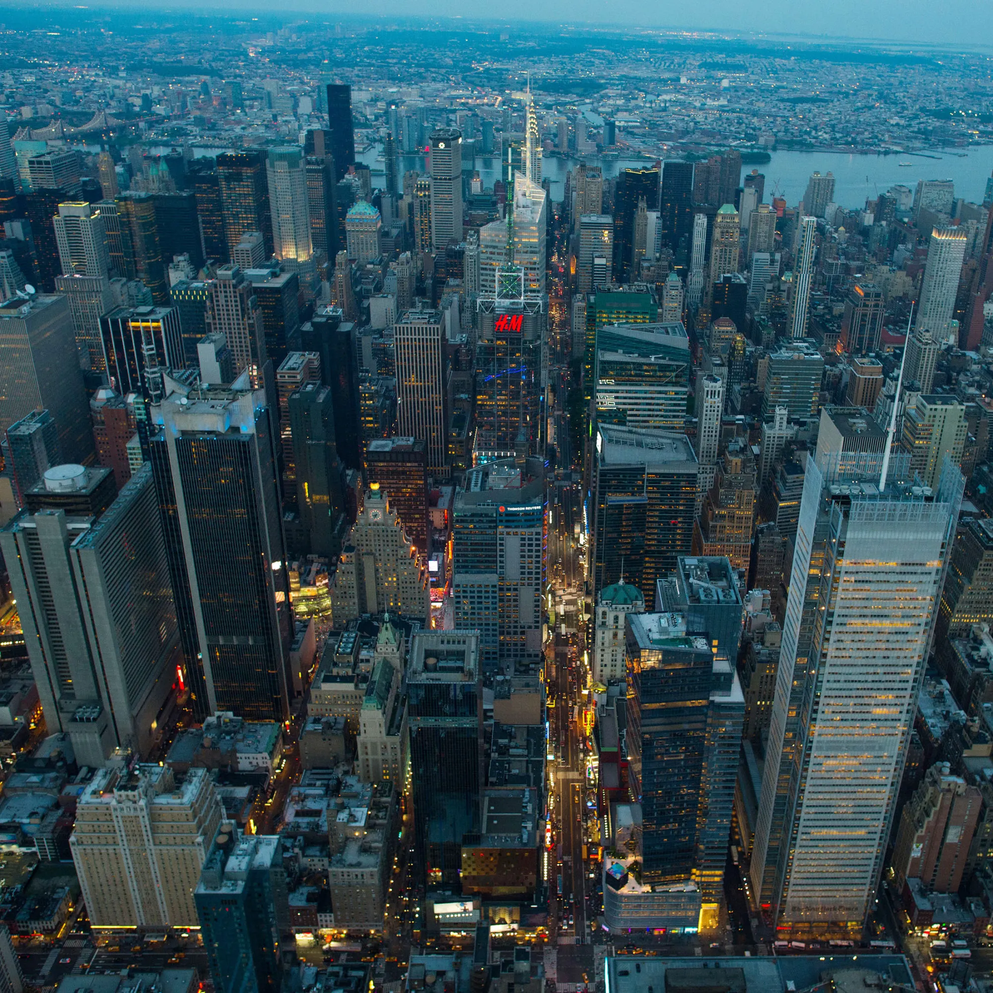The Empire State Building stands in the Manhattan skyline at dusk in this aerial photograph taken above New York, U.S., on Friday, June 19, 2015. The Standard &amp; Poor's 500 Index fell, with the gauge dropping below its price for the past 50 days, while Treasuries retreated.
