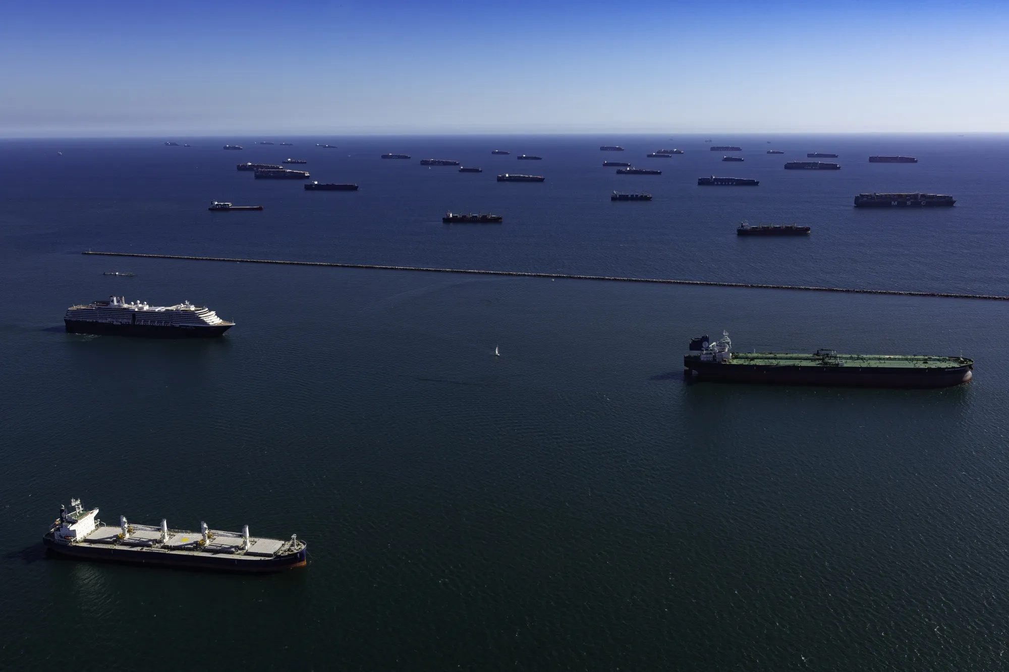 Profits are booming, yet the majors will produce less oil and gas in 2023 than 15 years ago.