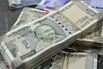 Currency Exchanges in New Delhi as Indian Rupee Falls to Record on Worries About US Tariff Impact
