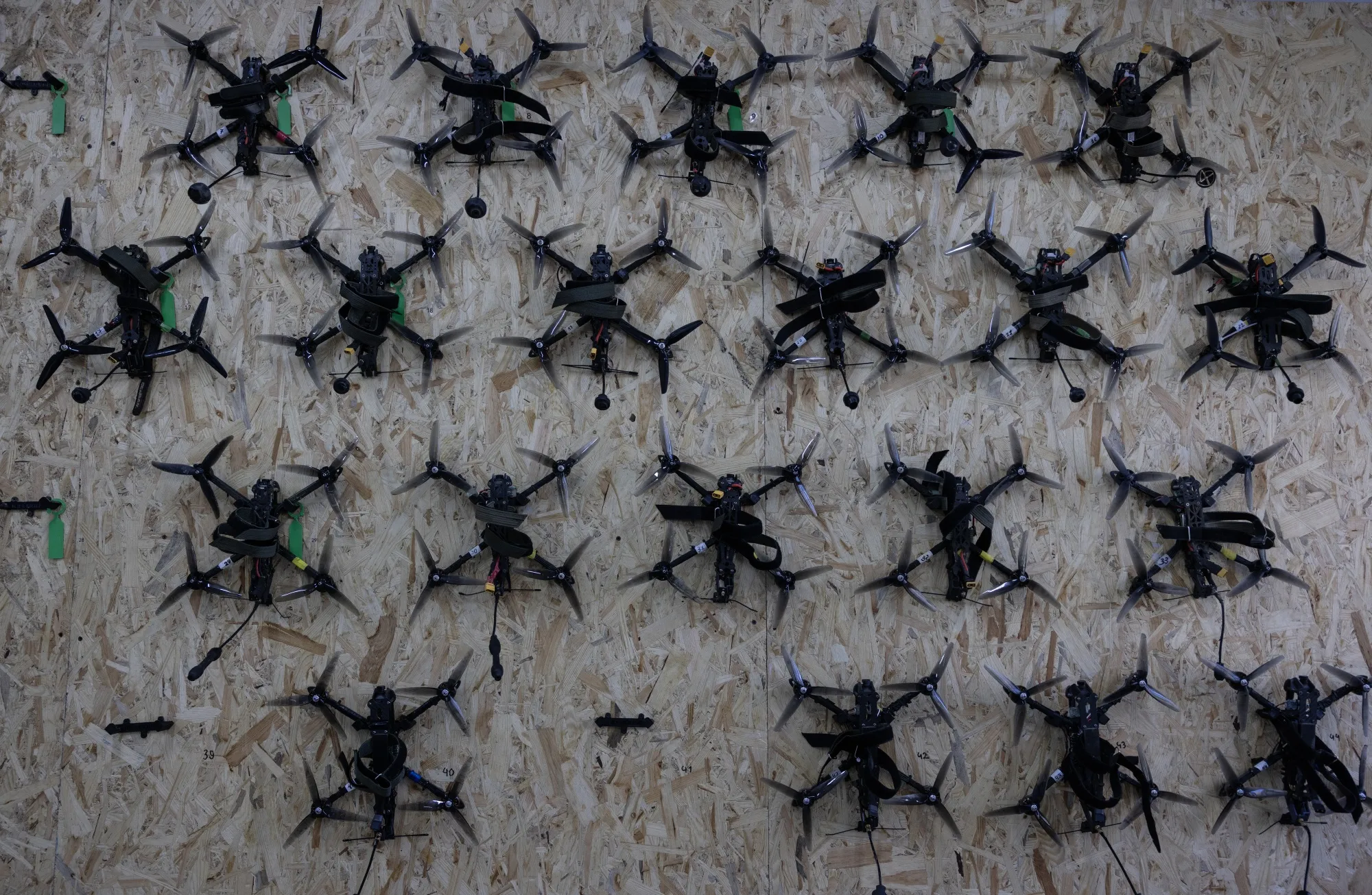 Drones hang on the wall during a class for&nbsp;students to learn to assemble and fly drones&nbsp;in Kyiv region on Sept. 3.&nbsp;