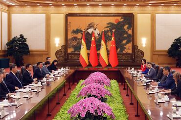 Pedro Sanchez and Xi Jinping