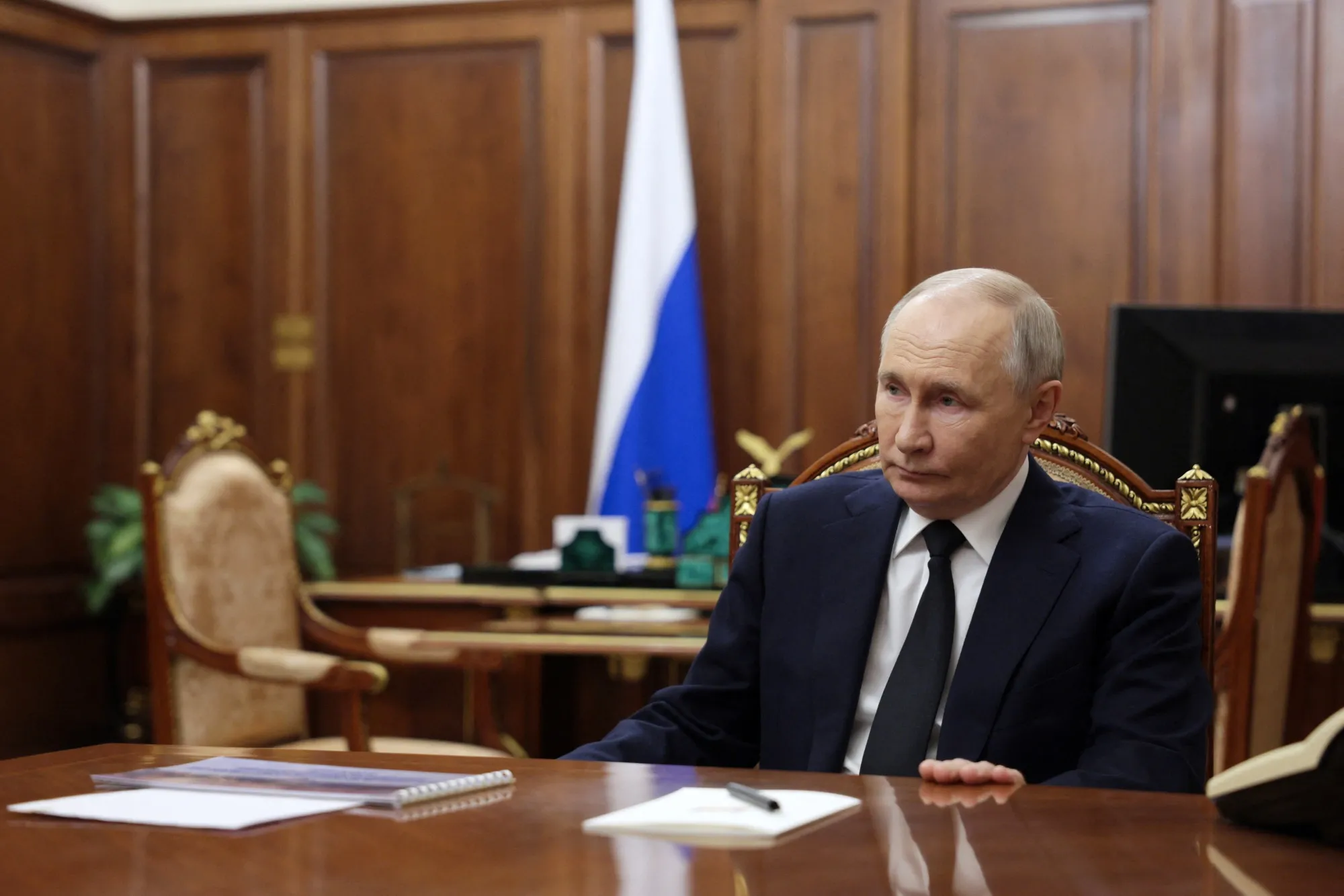 In this pool photograph distributed by the Russian state agency Sputnik,&nbsp;Vladimir Putin&nbsp; at the Kremlin in Moscow on February 10.