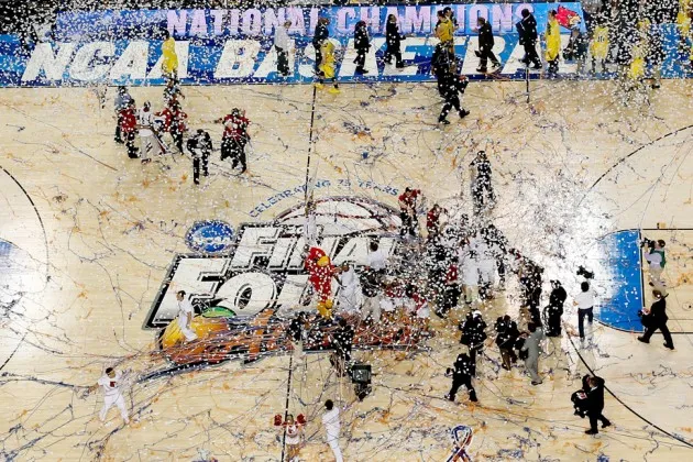 The Louisville Cardinals celebrate after winning the 2013 NCAA Men's Final Four Championship on April 8, 2013 in Atlanta