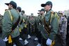 Iranian Revolutionary Guard soldiers attend the funeral of General Mohammad Ali Allahdadi, a Guard commander killed in southern Syria by an Israeli strike, outside the gate of a Guard base on January 21, 2015 in eastern Tehran.