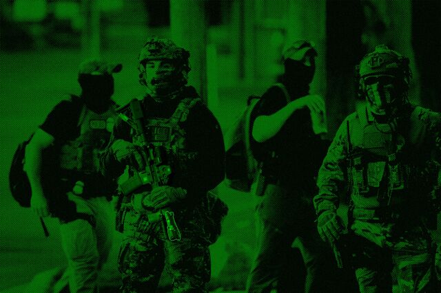 An image of federal immigration officers highlights tactical and military gear used 