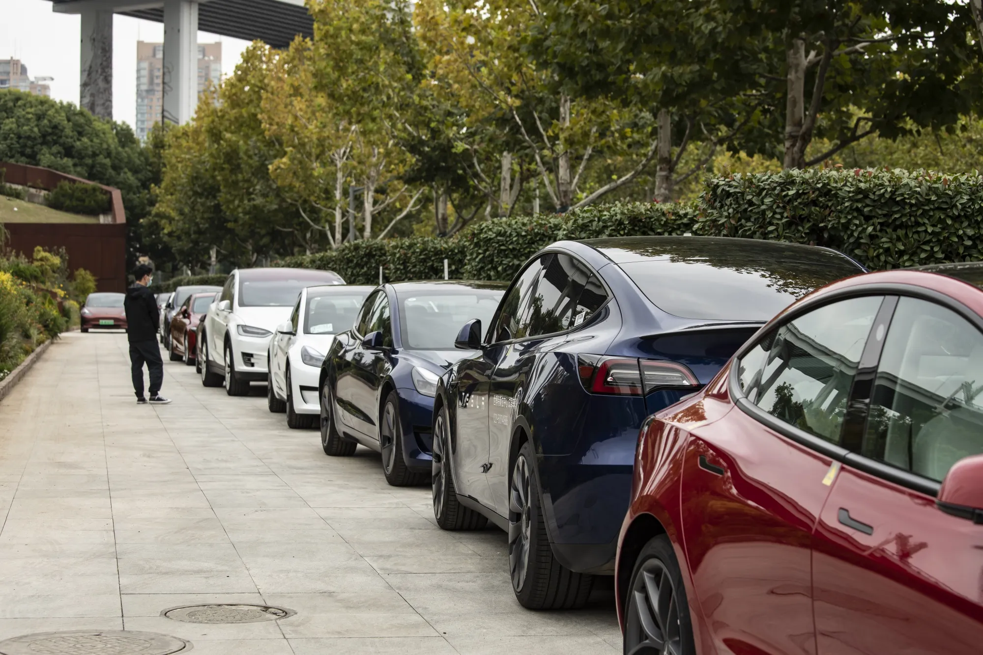 Tesla Inc. electric vehicles outside a showroom in Shanghai, China.