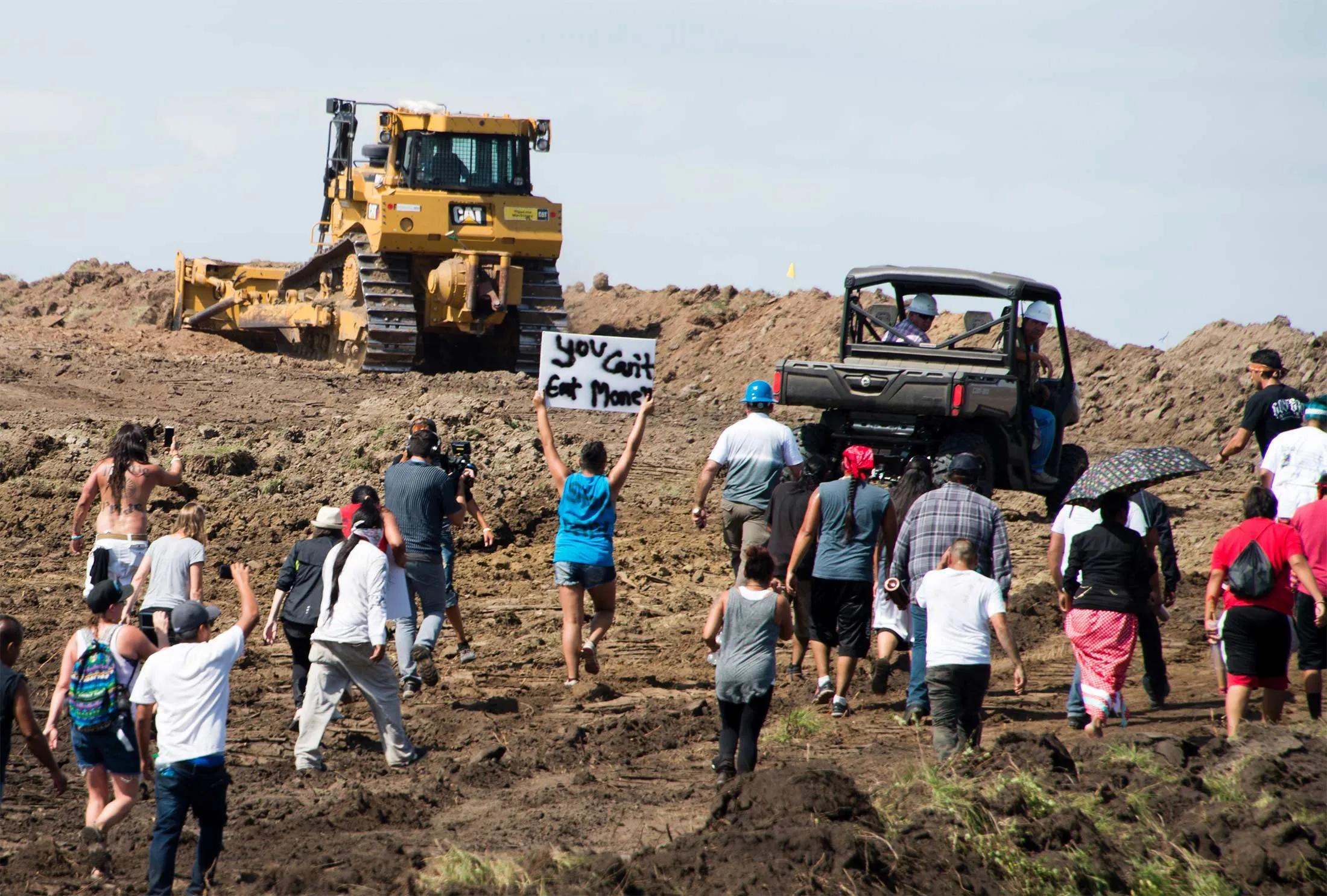 Protestors are confronted by security during a demonstration against the Dakota Access Pipeline (DAPL) oil pipeline, near Cannon Ball, North Dakota, Sept. 3, 2016.