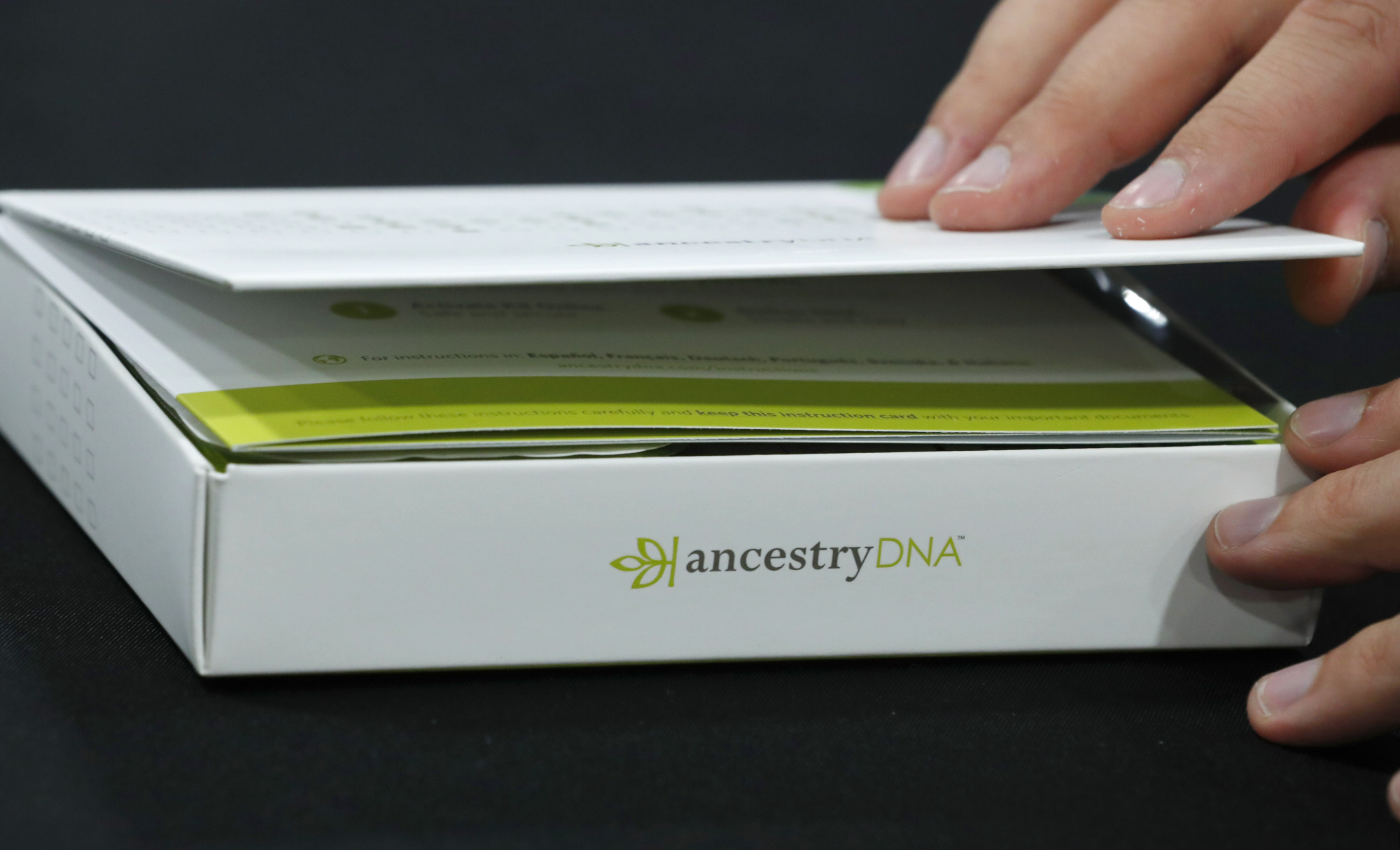 An attendee views an Ancestry&nbsp;DNA kit at the 2017 RootsTech Conference in Salt Lake City, Utah, U.S., on Thursday, Feb. 9, 2017. The four-day conference is a genealogy event focused on discovering and sharing family connections across generations through technology.