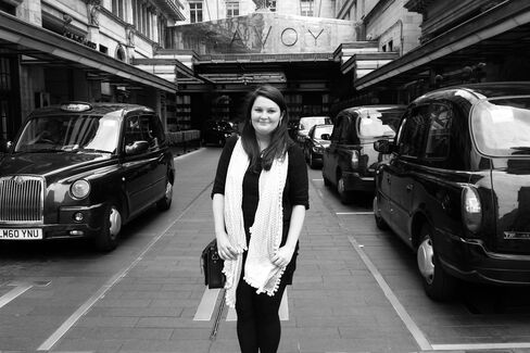 Author Williams, whose Gin Glorious Gin charts gin's journey to contemporary cool, stands in front of the Savoy Hotel.