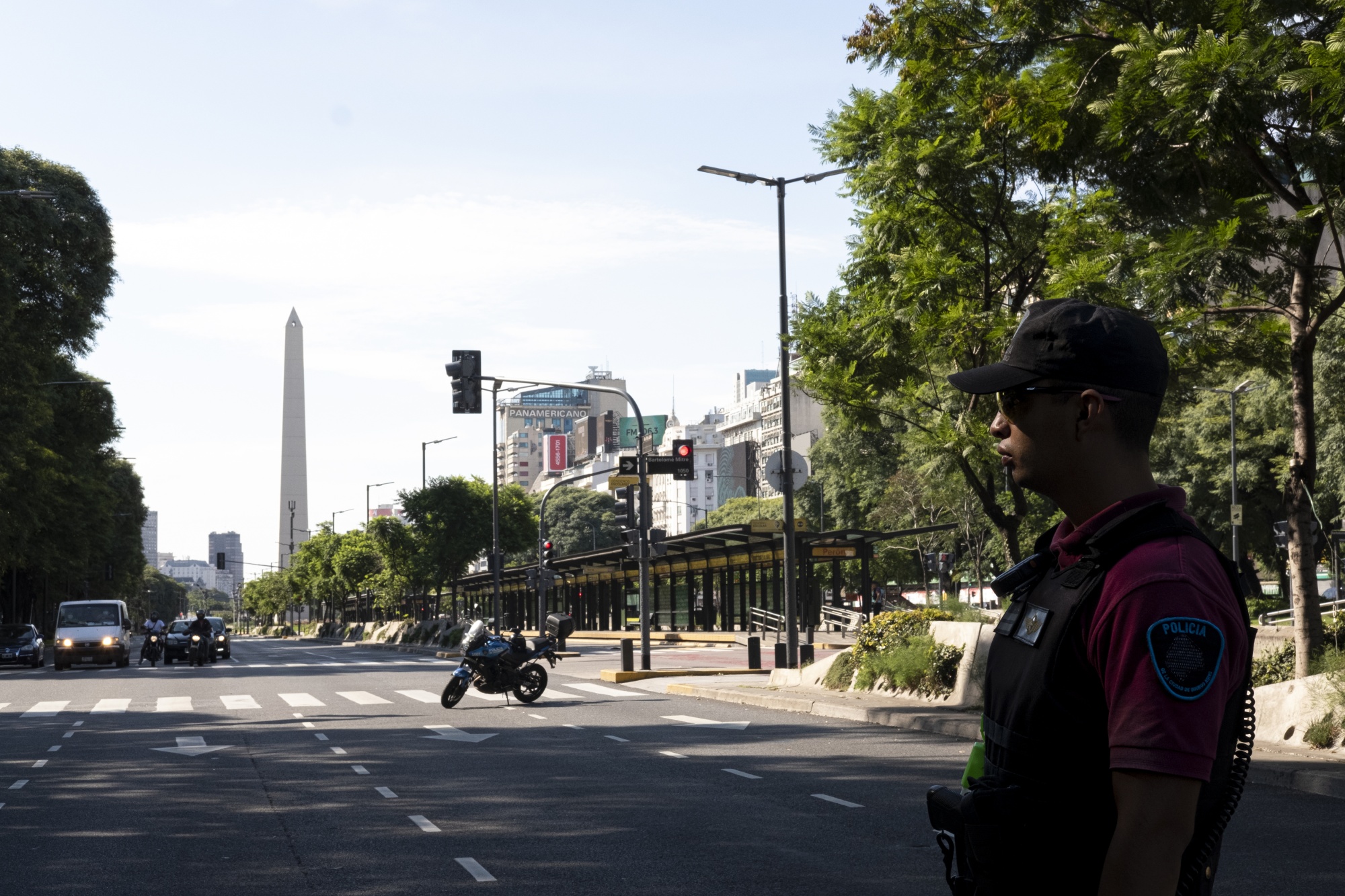 A police officer stands at a checkpoint on 9 de Julio Avenue in Buenos Aires on March 27.