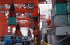 at a shipping terminal in Tokyo, Japan, on Wednesday, Nov. 11, 2014. Japan's exports rose the most in eight months in October, supporting an economy that fell into recession last quarter.