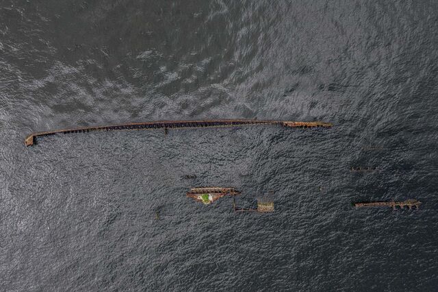 Abandoned, rotting ships, boats and seafare structures float in the surroundings of the Guanabara bay in Sao Gonçalo, Rio de Janeiro.