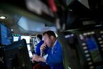 A trader works on the floor of the New York Stock Exchange (NYSE) in New York, U.S., on Monday, July 2, 2018.