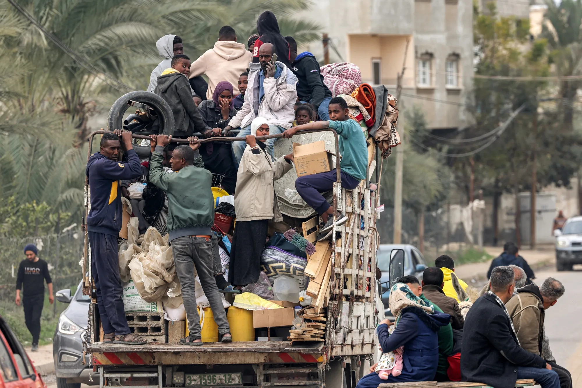 People flee from Rafah yesterday.