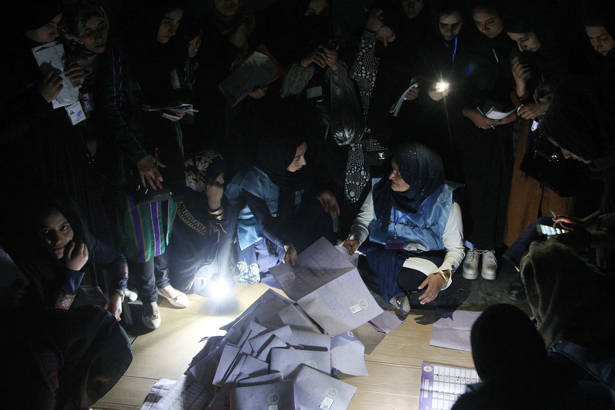 Officials count votes at a polling station after the first day of parliamentary elections in Herat, Afghanistan on Oct.&nbsp;20, 2018.&nbsp;