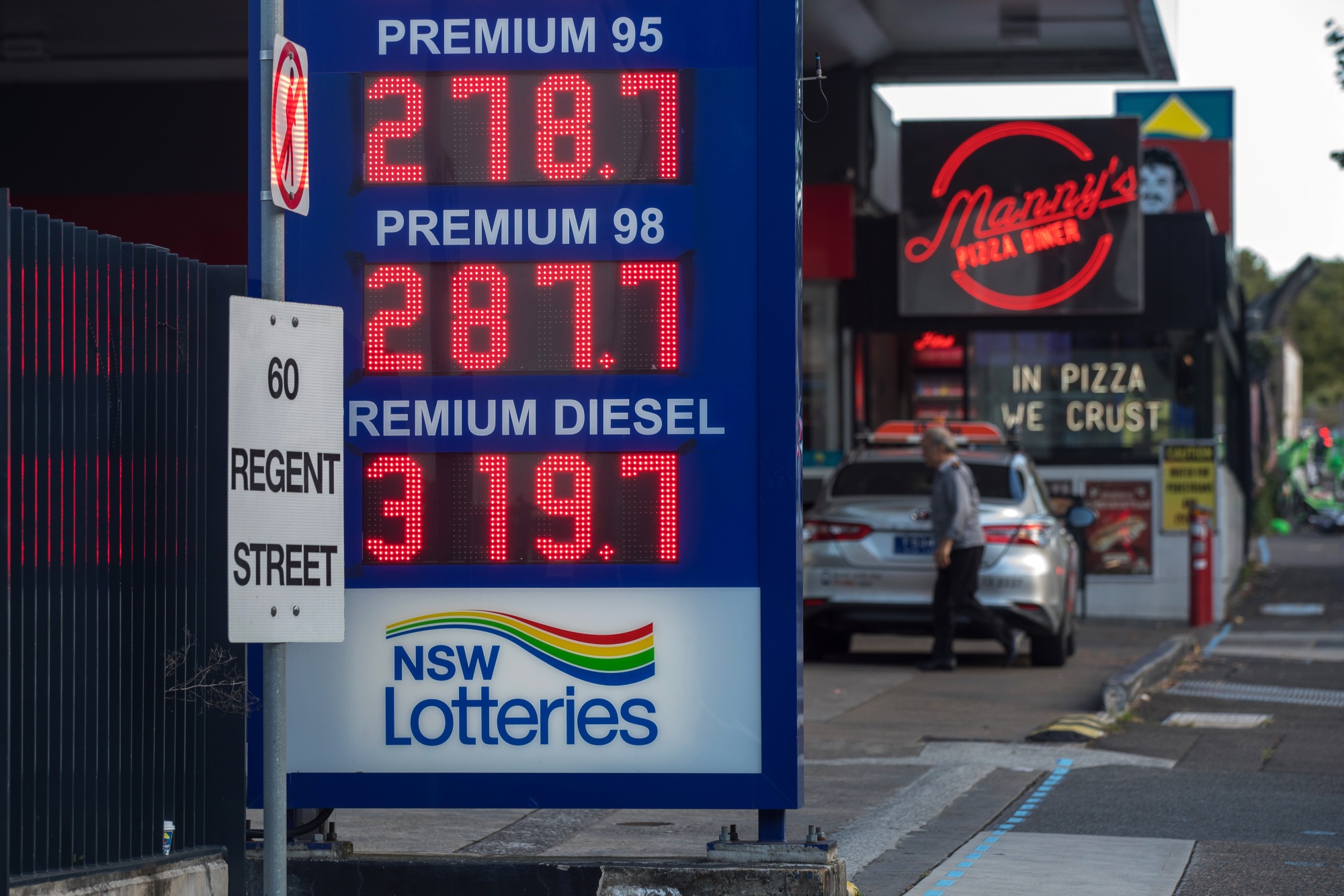 Gasoline prices displayed at a Budget Petrol petrol station in Sydney, Australia, on Wednesday, March 25, 2026. Hundreds of service stations across Australia have reported fuel shortfalls, as the war in the Middle East disrupts global supplies. Photographer: Brent Lewin/Bloomberg 