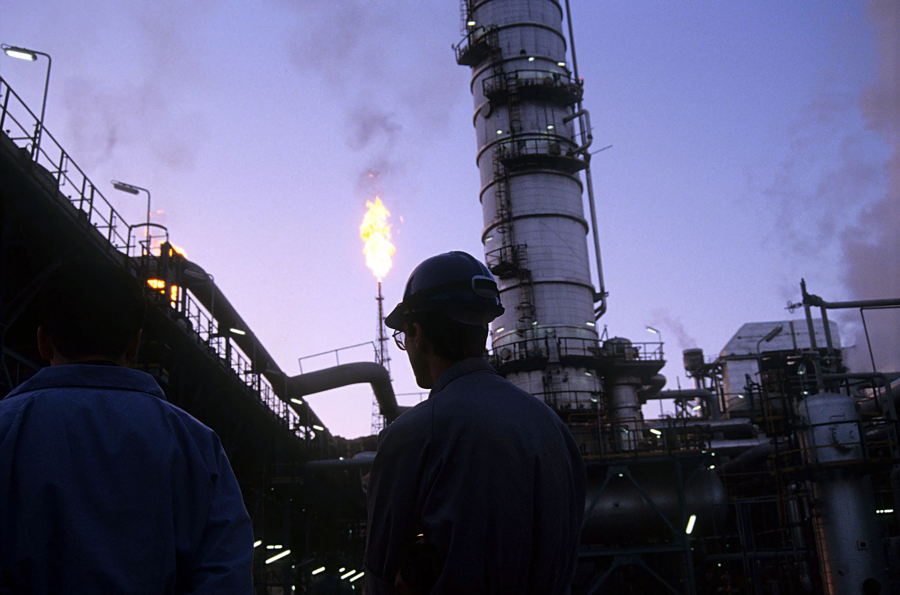 Technicians work on&nbsp;an oil&nbsp;installation on Kharg Island, off the coast of Iran.&nbsp;