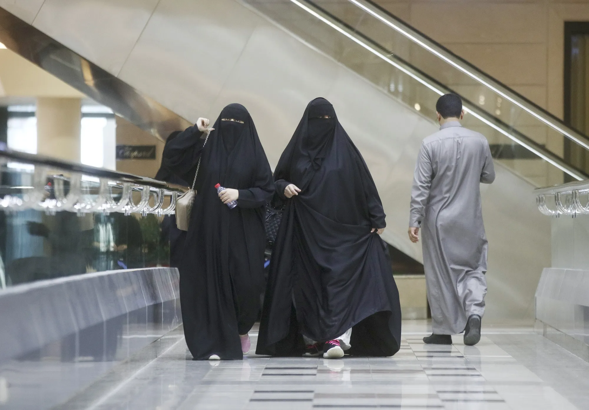 Female shoppers walk through the Kingdom Centre shopping mall in Riyadh, Saudi Arabia, on Dec. 2, 2016.&nbsp;