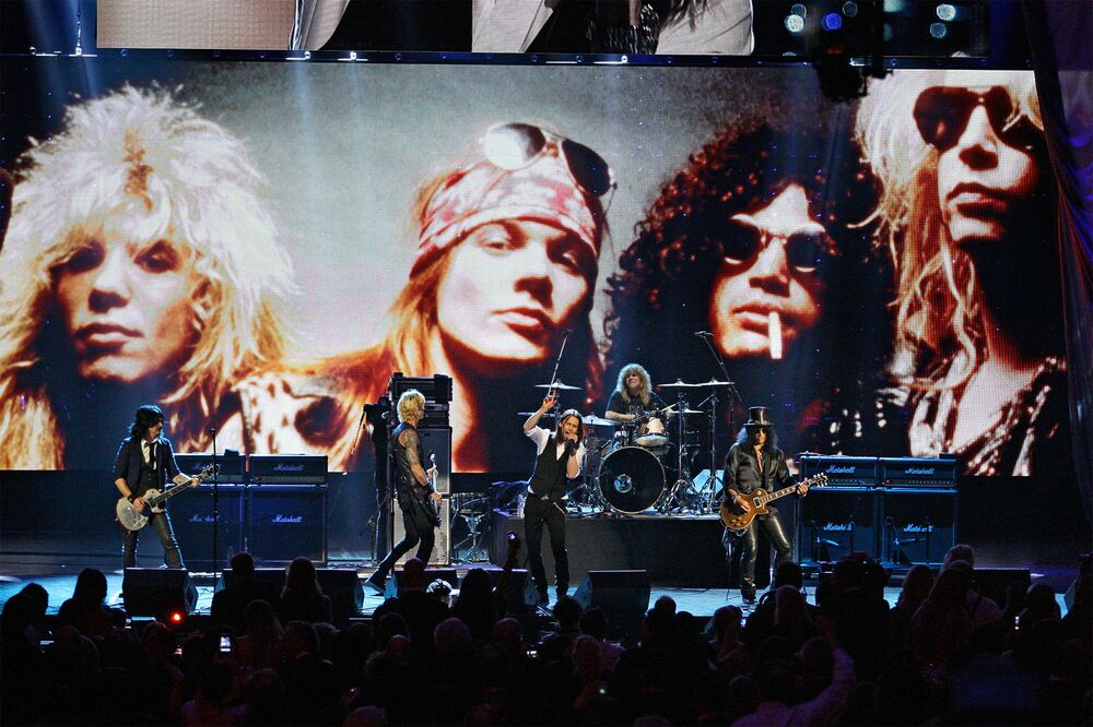 Guns N' Roses performs with singer Myles Kennedy after their induction into the Rock and Roll Hall of Fame in Cleveland in 2012.
