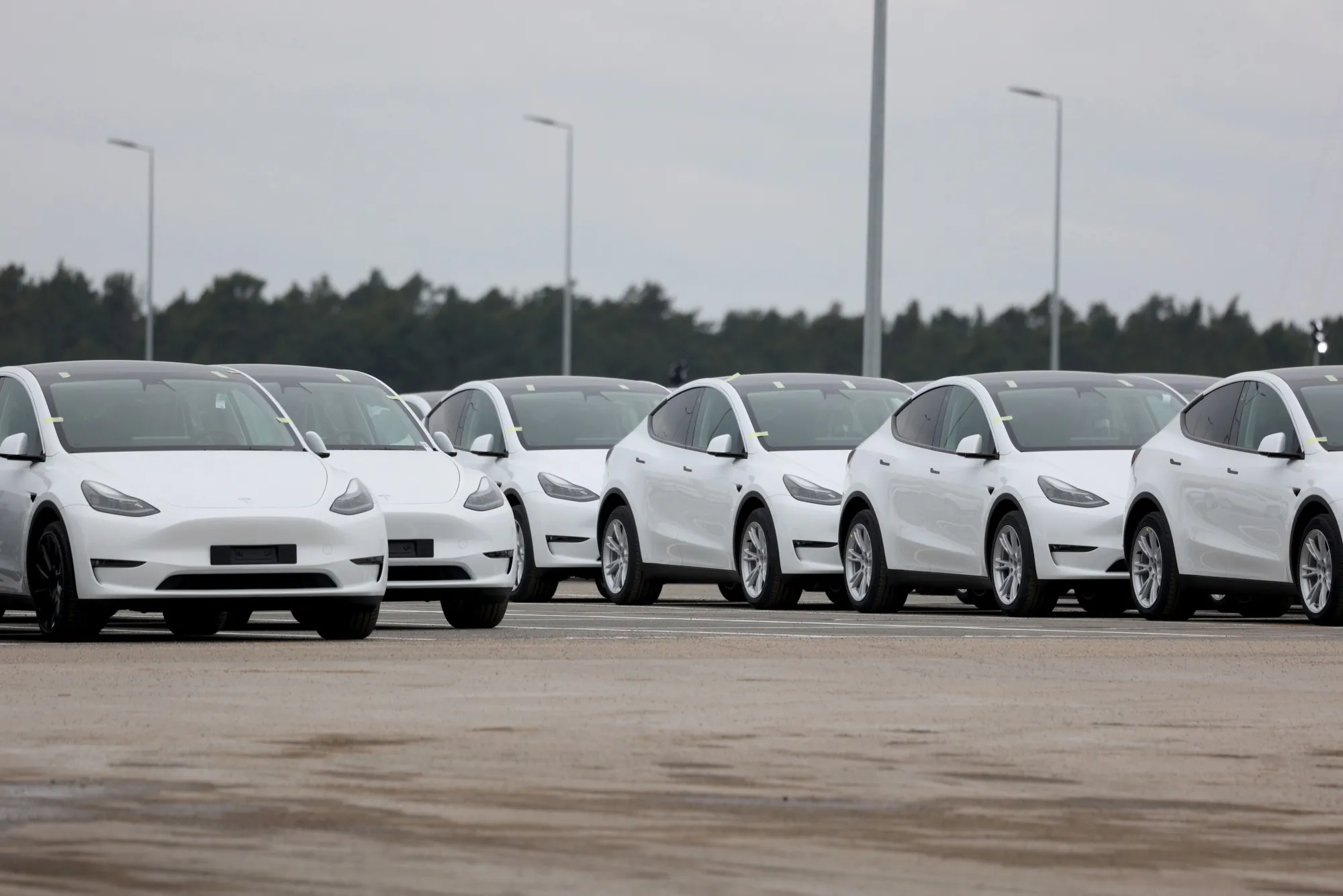 Tesla Model Y electric vehicles in a lot at the Tesla Inc. Gigafactory in Gruenheide, Germany.