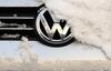 Snow rests on the hood of a used Volkswagen AG automobile on the forecourt of a VW showroom in Berlin, Germany, on Friday, Jan. 8, 2016. Volkswagen may buy back tens of thousands of cars with diesel engines that can\'t be easily fixed to comply with U.S. emissions standards as part of its efforts to satisfy the demands of regulators, according to two people familiar with the matter.