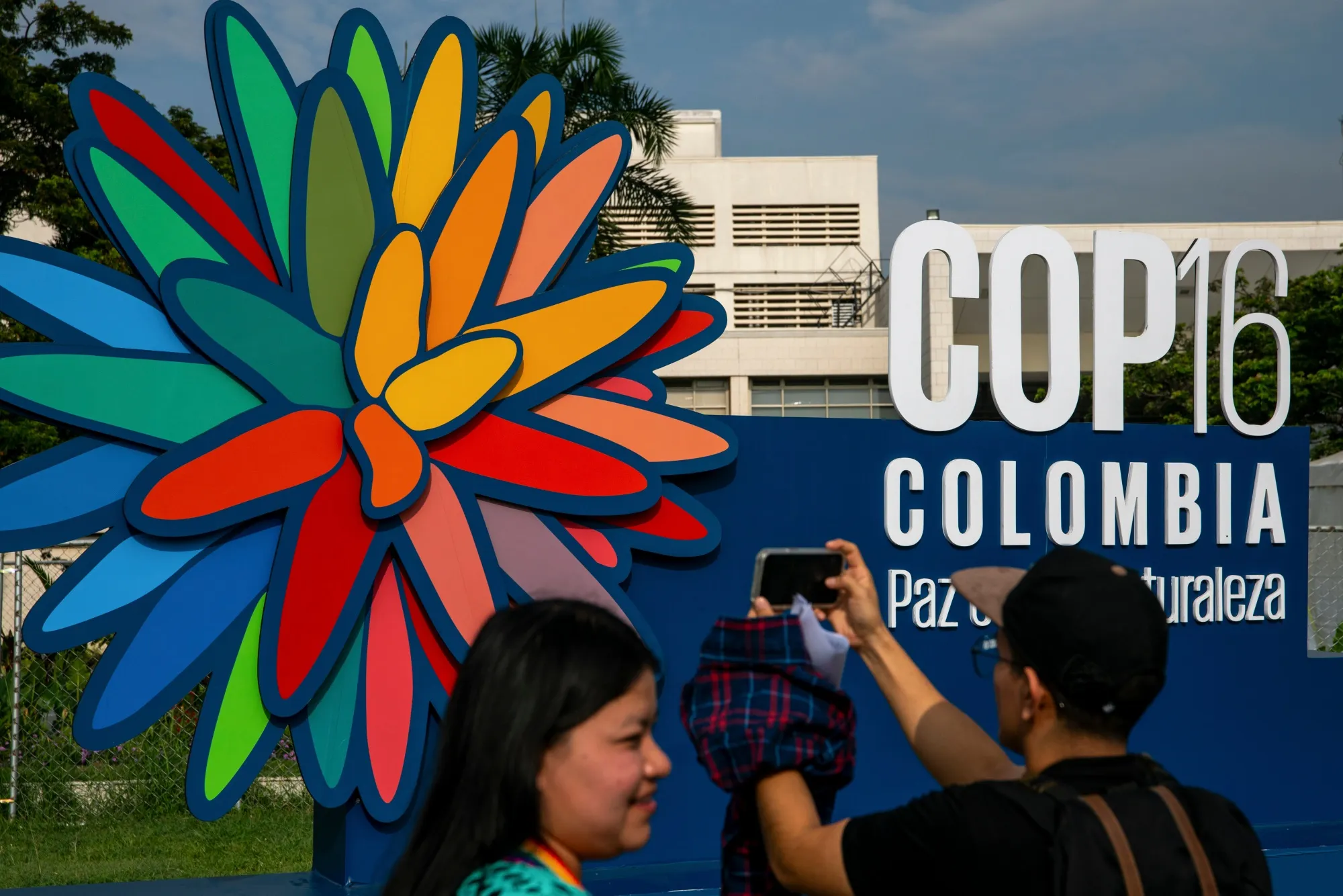 Attendees arrive for the United Nations Biodiversity Conference (COP16) in Cali, Colombia, on Oct. 29, 2024. At this year's biodiversity talks, known as COP16, negotiators worked through a host of thorny issues, particularly how to finance ecosystem protection.