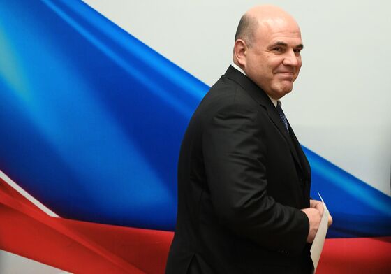 High-Tech Taxman Who Loves Hockey Is Putin’s New Premier