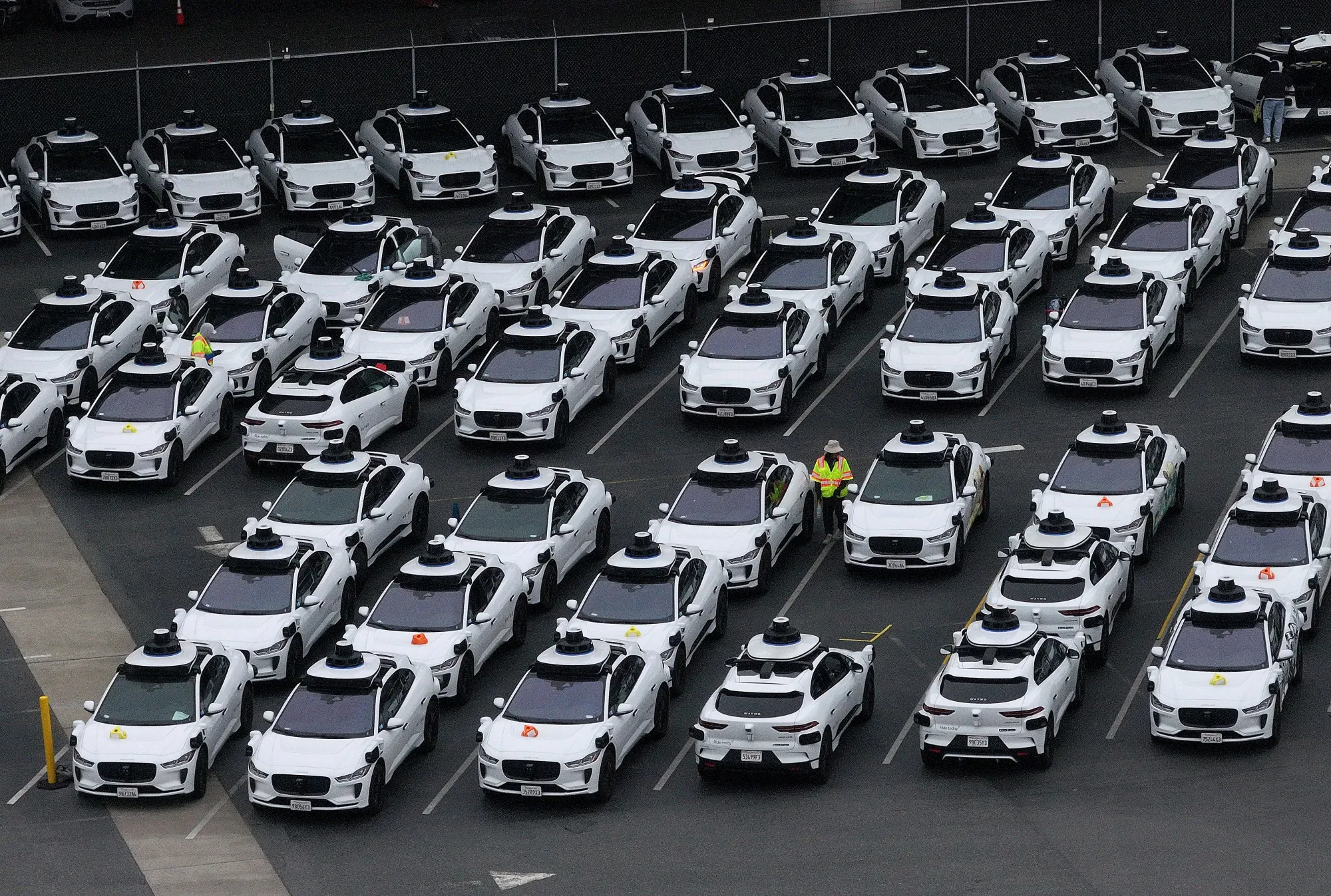 Waymo cars at a Waymo facility in San Francisco