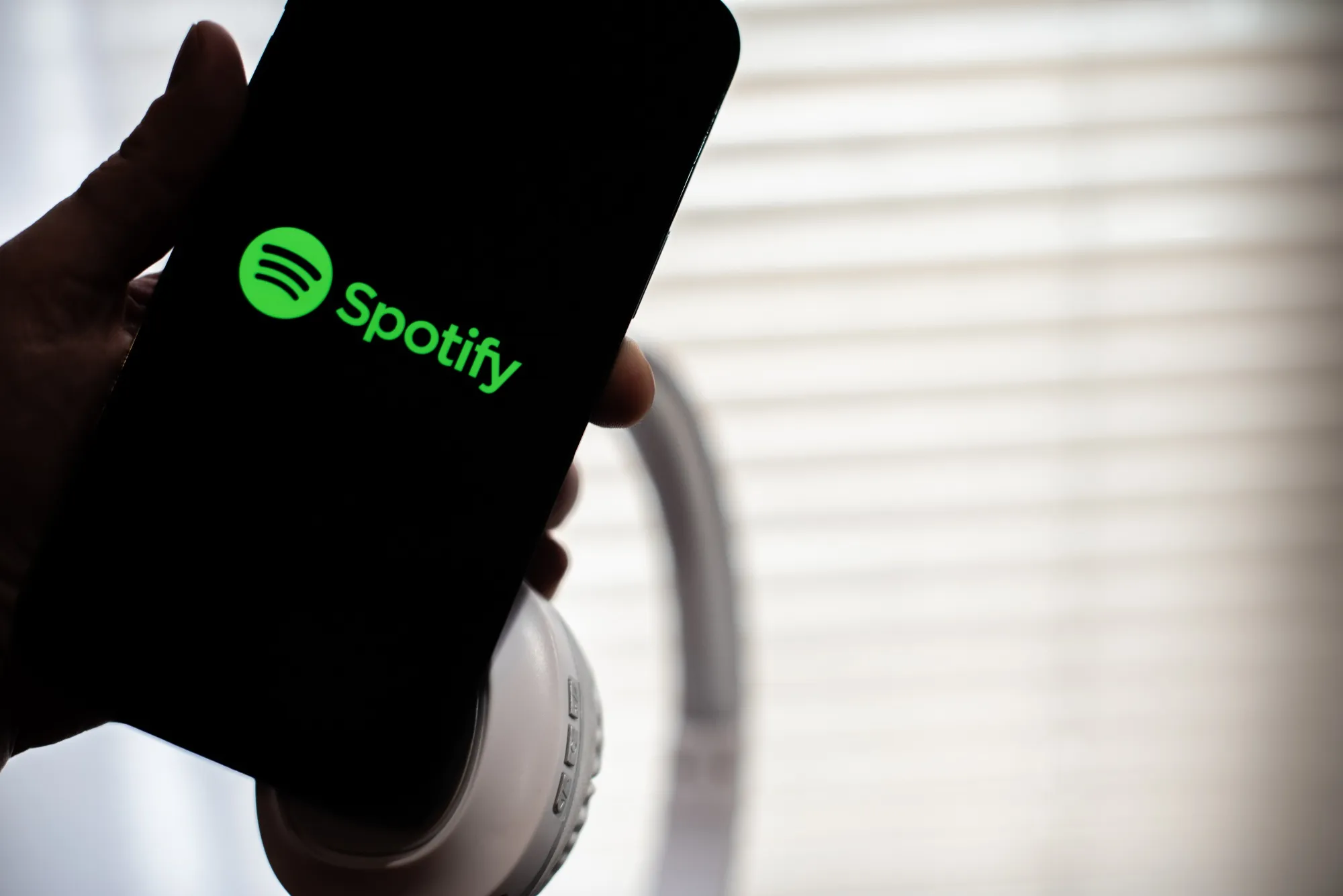 The Spotify logo on a smartphone arranged in Hastings-on-Hudson, New York, US, on Wednesday, Jan. 25, 2023.