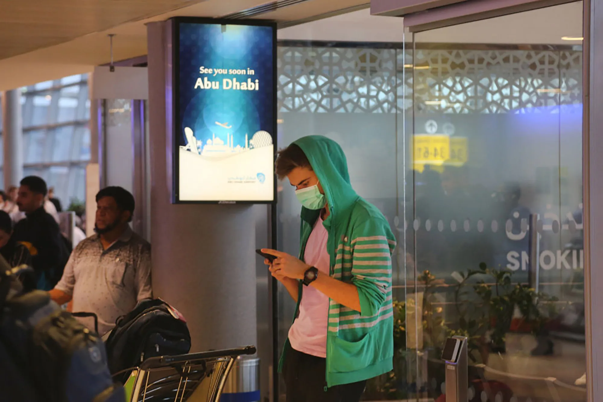 A traveler atAbu Dhabi International Airport in Abu Dhabi, United Arab Emirates.