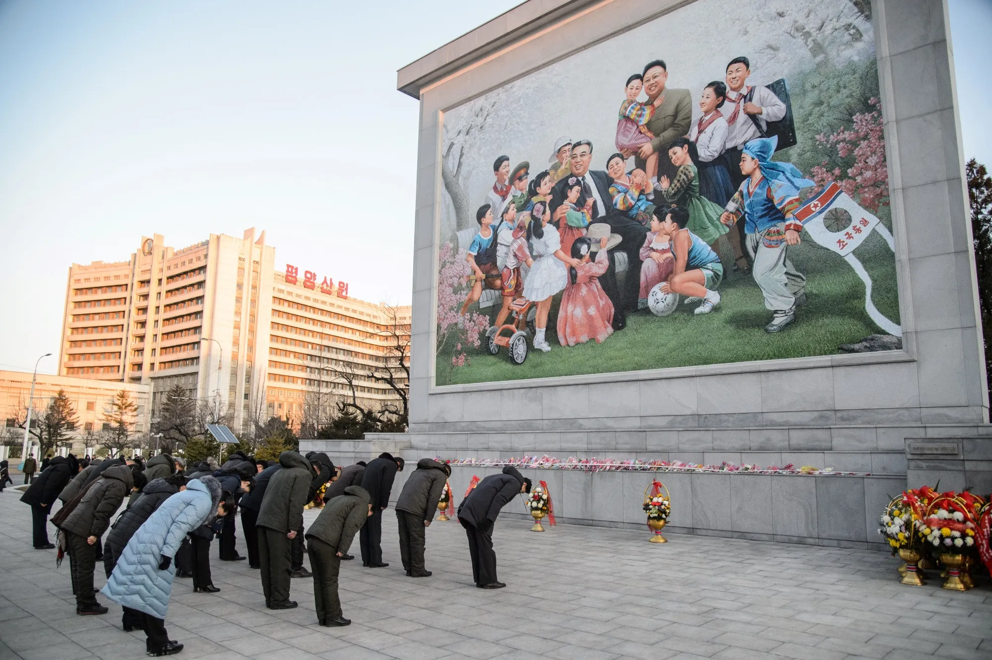 Paying their respects.
