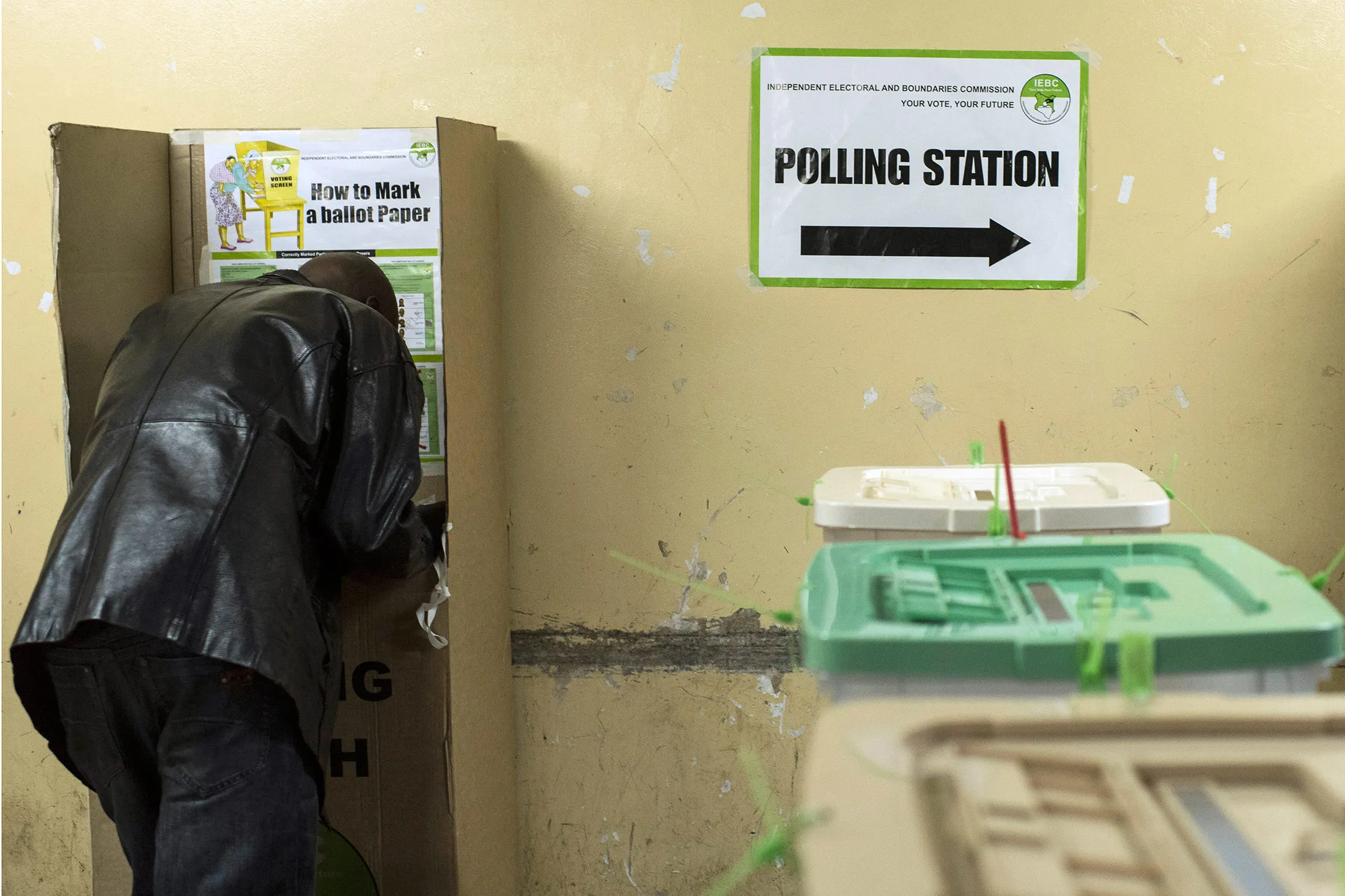 Kenyans vote at a polling station at a school in Kibera on Aug. 8.
