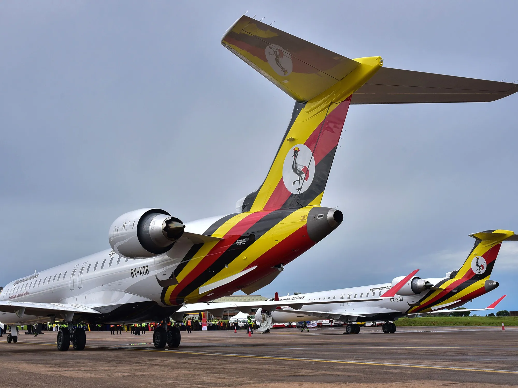 Newly acquired Uganda Airlines Bombardier CRJ900 aircraft stands on the runway at Entebbe Airport on the outskirts of Kampala on April 23, 2019.