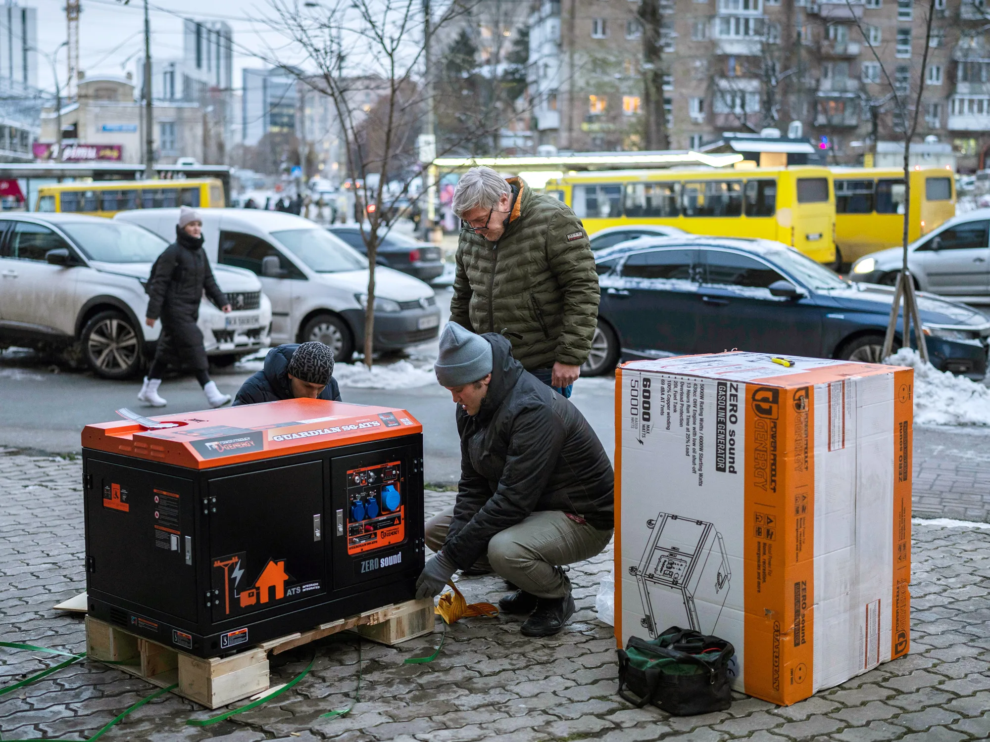 A generator is unpacked to be used at a bank in Kyiv.