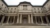 The Bank of Japan (BOJ) headquarters stand in Tokyo, Japan, on Tuesday, July 16, 2019. The BOJ would offer support for a government spending package likely to be unveiled in October when a national sales tax is increased, according to a former central bank official.