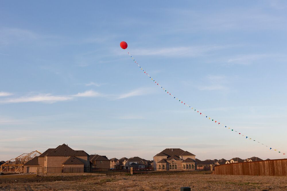 Free Vacations 100 000 S Homebuilders Get Desperate A Large Balloon Floats Over S Office At Creeks Of Legacy Housing Development