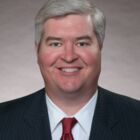 Headshot of Christian Nelly