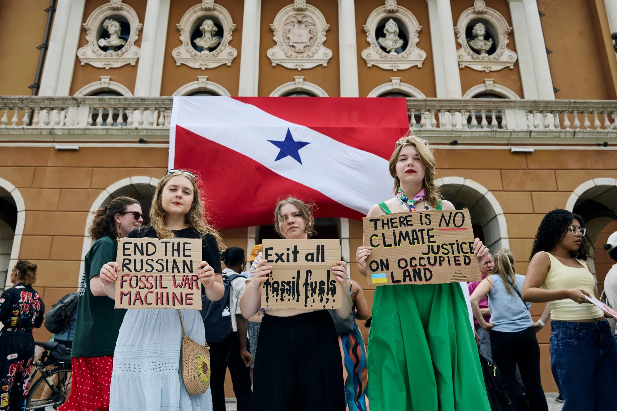 Demonstrators hold a protest at COP30.