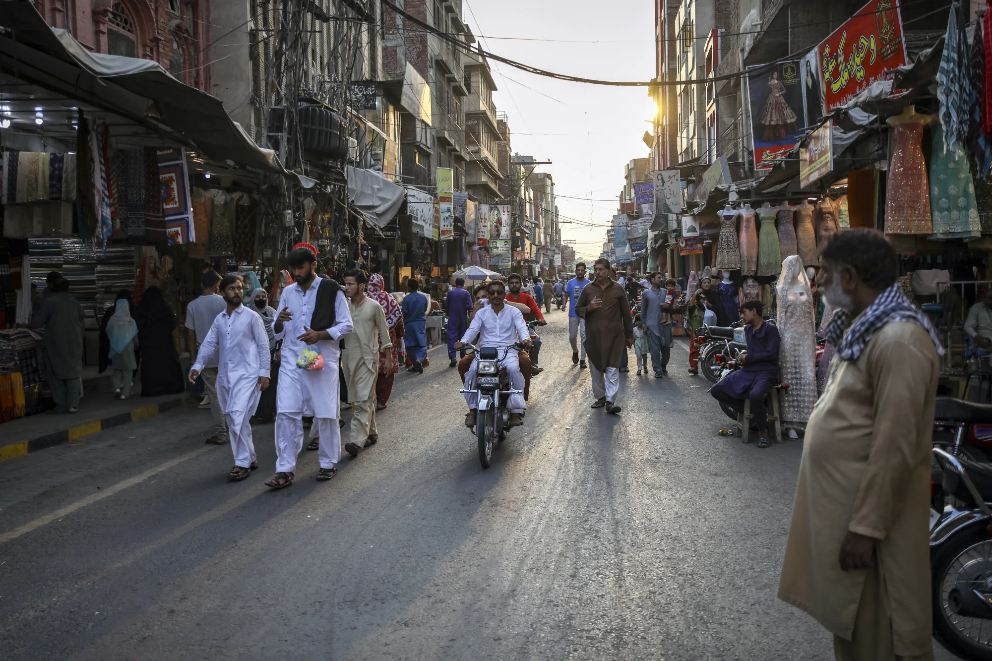 Pedestrians at a textile market in Faisalabad, Punjab, Pakistan.