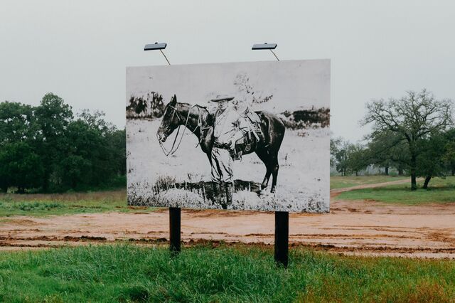 A billboard of Theodore Roosevelt at Proto-Town. 