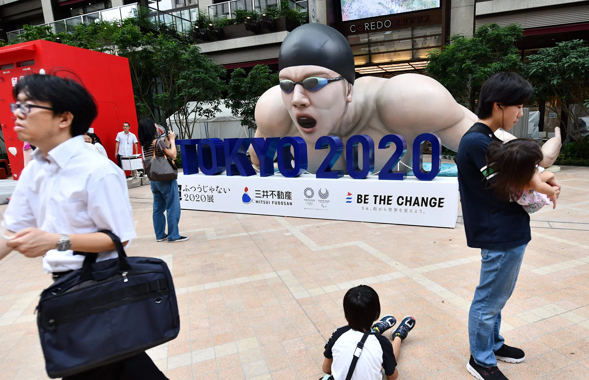 A person takes a photo of an Olympics decoration&nbsp;in Tokyo on July 23, 2019.&nbsp;