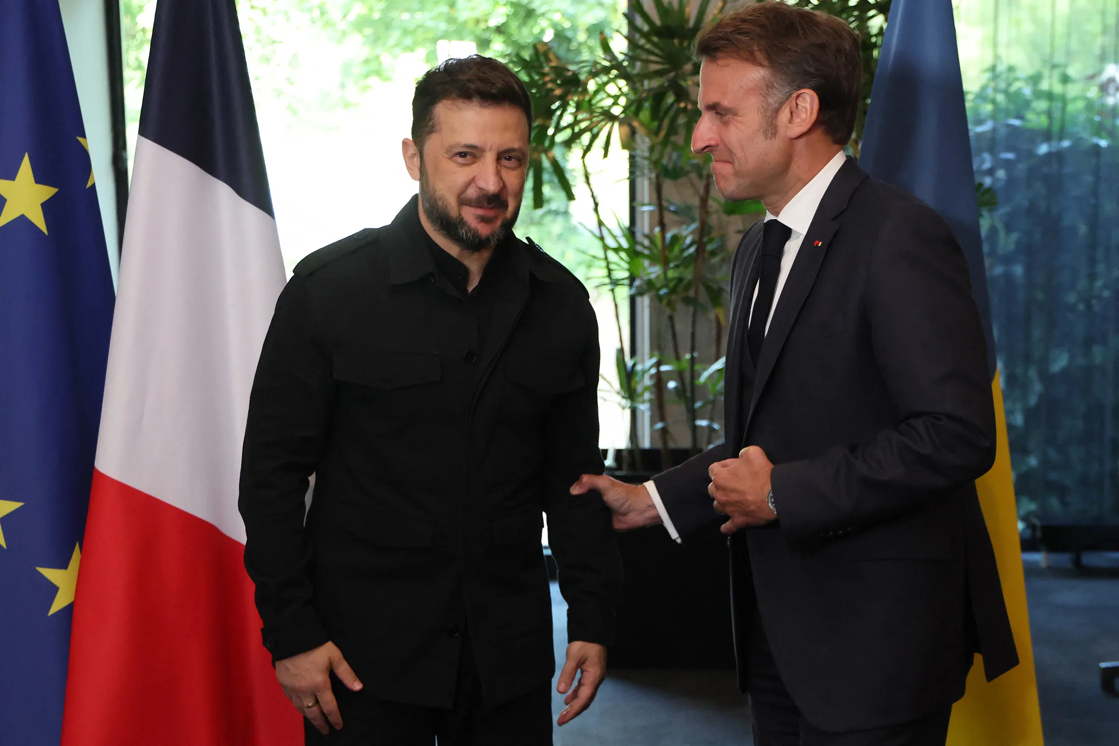 Volodymyr Zelenskiy, left, and&nbsp;Emmanuel Macron&nbsp;on the sidelines of the two-day NATO's Heads of State and Government summit in The Hague on June 24.